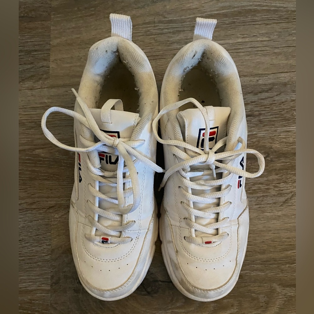 FILA tennis shoes in white.